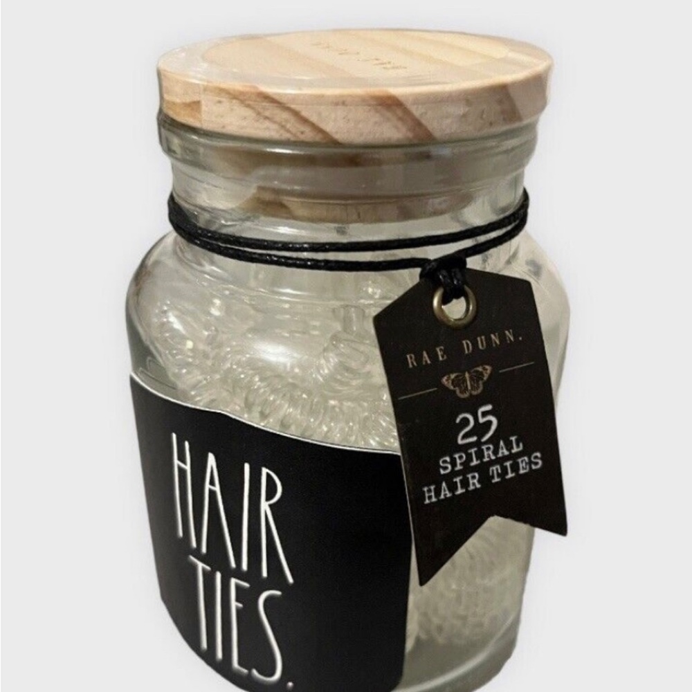 BRAND NEW Rae Dunn Small Glass Jar
Canister With 25 Spiral Hair ties. BRAND NEW